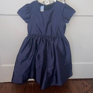 Adorable girls Bella bliss navy dress with pretty detail on the waist.